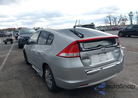 2010 Honda Insight Lx from USA, damaged, VIN JHMZE2H52AS011638